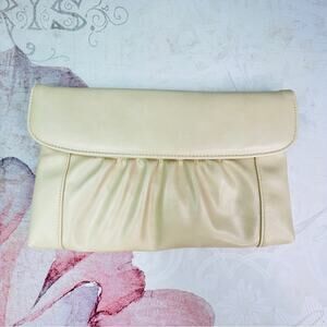 Vintage cream clutch with strap